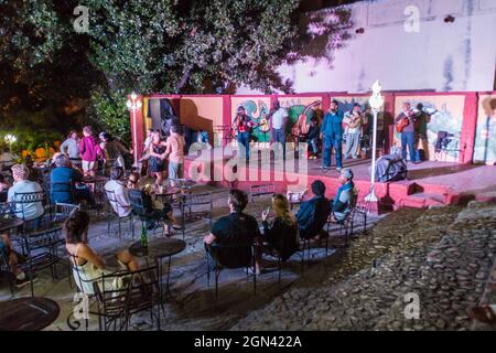 TRINIDAD, CUBA - FEB 8, 2016: People enjoy music performance in Casa de la Musica in Trinidad, Cuba. Stock Photo