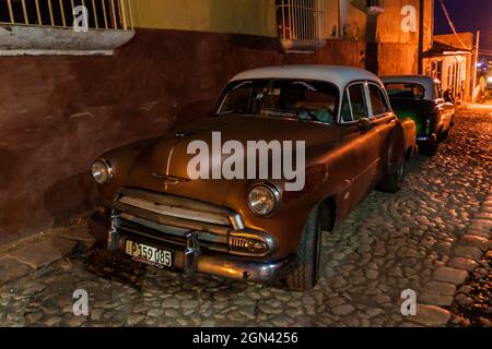 TRINIDAD, CUBA - FEB 9, 2016: Vintage car on a street in the center of Trinidad, Cuba. Stock Photo