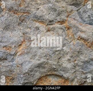 A Simple Orange and Grey Rock Texture Stock Photo