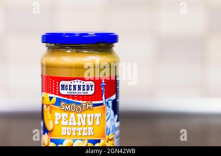 POZNAN, POLAND - Nov 20, 2018: A Mcennedy Peanut Butter smooth in a glass  jar on a wooden table Stock Photo - Alamy