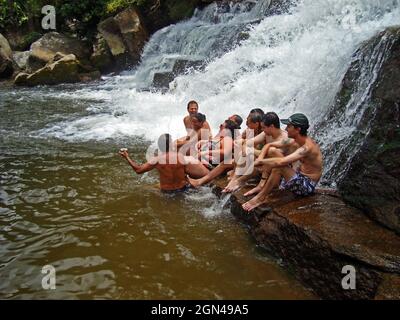TERESOPOLIS, RIO DE JANEIRO, BRAZIL - MARCH 19, 2007: People enjoying on waterfall