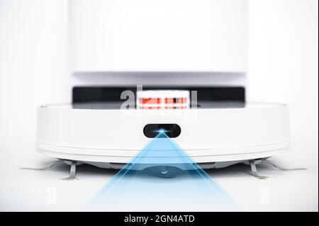Modern robotic vacuum cleaner isolated on white background Stock Photo