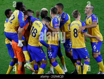 Sheffield, England, 21st September 2021.  Southampton players celebrate with goalkeeper Fraser Forster after winning a penalty shoot out to decide the Carabao Cup match at Bramall Lane, Sheffield. Picture credit should read: Darren Staples / Sportimage Credit: Sportimage/Alamy Live News Stock Photo