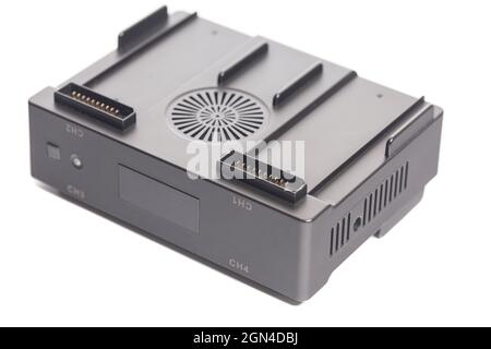 Drone battery charger hub with digital display isolated on white. Stock Photo