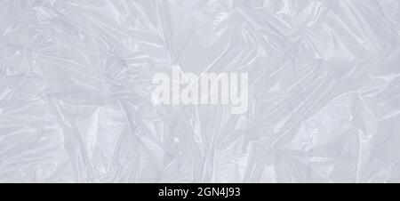 Plastic transparent cellophane background. White texture background Stock Photo