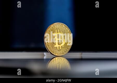 Photo Golden Bitcoins, new virtual money. Virtual cryptocurrency concept Stock Photo