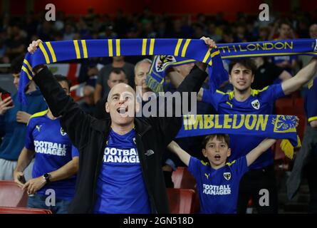 London, England, 22nd September 2021. Wimbledon fans show their support during the Carabao Cup match at the Emirates Stadium, London. Picture credit should read: David Klein / Sportimage Credit: Sportimage/Alamy Live News Stock Photo