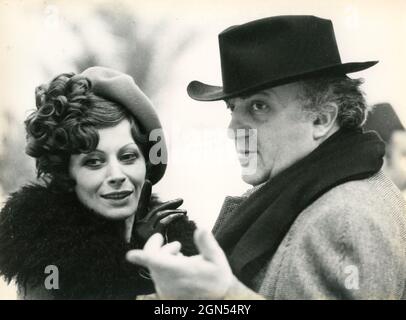 Italian movie director Federico Fellini and French actress Magali Noel filming the movie Amarcord, 1973