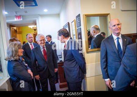 Washington, United States Of America. 22nd Sep, 2021. United States Senate Minority Leader Mitch McConnell (Republican of Kentucky), center, chats with United States Senator Joni Ernst (Republican of Iowa), left, United States Senator John Barrasso (Republican of Wyoming), second from right, and United States Senator Rick Scott (Republican of Florida), right, as he arrives to join GOP Senators for a press conference on the debt limit at the US Capitol in Washington, DC, Wednesday, September 22, 2021. Credit: Rod Lamkey/CNP/Sipa USA Credit: Sipa USA/Alamy Live News Stock Photo