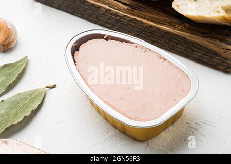 Liver pate on toast set, on white stone table background Stock Photo