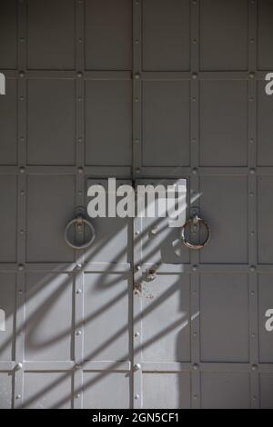 Full frame of closed iron gate of church. Stock Photo