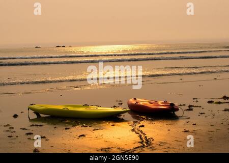 Paddle Boards On The Beach - Two paddle boards sit on the beach at the Hobuck Beach Resort, near Neah Bay. Stock Photo