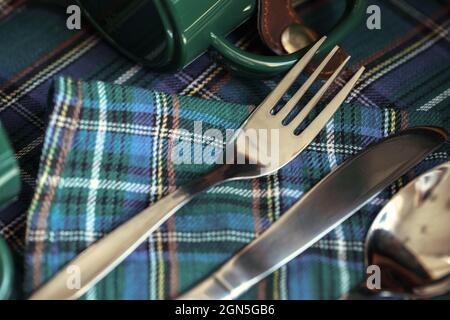 Green plastic kitchenware on a table close up Stock Photo