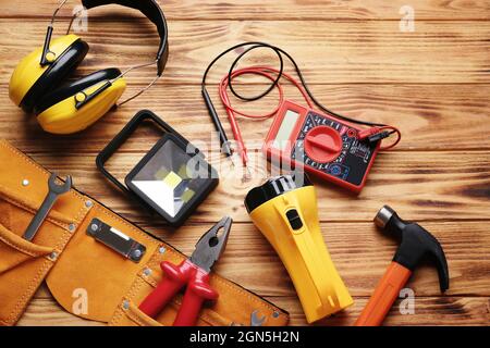 Safety equipment on wooden background Stock Photo