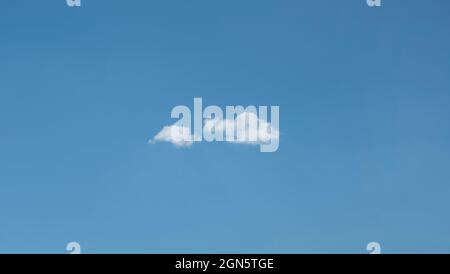Only two clouds in a blue sky. Great for background use. Stock Photo