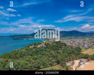 Aerial Panorama view of Vonitsa town and the castle. Vonitsa is a historical picturesque coastal town in the northwestern part of Aetolia Acarnania in Stock Photo