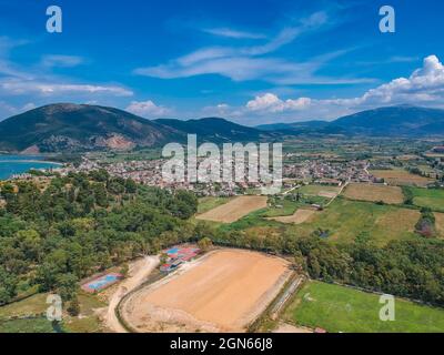 Aerial Panorama view of Vonitsa town and the castle. Vonitsa is a historical picturesque coastal town in the northwestern part of Aetolia Acarnania in Stock Photo