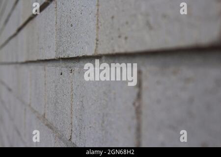 White brick wall with depth of field. Stock Photo