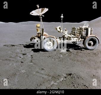 This photograph of the Lunar Roving Vehicle (LRV) was taken during the Apollo 15 mission. Powered by battery, the lightweight electric car greatly increased the range of mobility and productivity on the scientific traverses for astronauts. It weighed 462 pounds (77 pounds on the Moon) and could carry two suited astronauts, their gear and cameras, and several hundred pounds of bagged samples. The LRV's mobility was quite high. It could climb and descend slopes of about 25 degrees Stock Photo