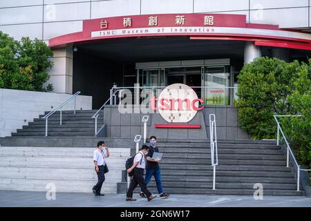 Hsinchu, Taiwan. 22nd Sep, 2021. A Person Walks Past A TSMC (Taiwan ...