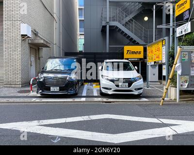 Tokyo, Japan - 20 November 2019: Outdoor Parking Garage for two cars by Times in Tokyo Stock Photo