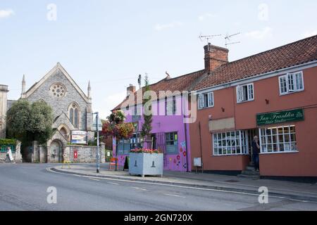 Views of the Methodist Church and the Glastonbury High Street in Somerset in the UK Stock Photo