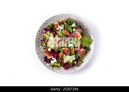 Figs salad with cheese and walnuts isolated on white background Stock Photo