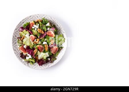 Figs salad with cheese and walnuts isolated on white background Stock Photo
