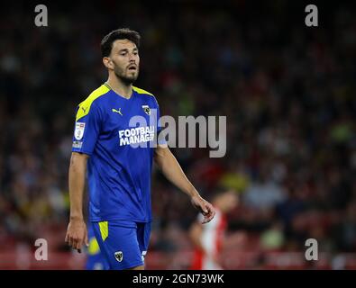 London, England, 22nd September 2021. Will Nightingale of AFC Wimbledon during the Carabao Cup match at the Emirates Stadium, London. Picture credit should read: David Klein / Sportimage Credit: Sportimage/Alamy Live News Stock Photo