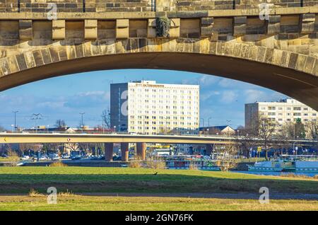 Dresden, Saxony, Germany: View through an arch of Augustus Bridge towards the Hotel Am Terrassenufer. Stock Photo
