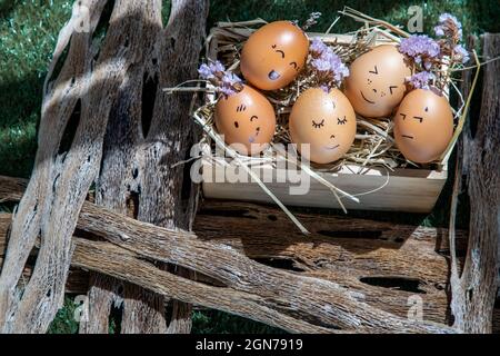 A conceptual image of Group of eggs with various emotions. Representing racial harmony, Diversity, integration and emotional, Happy and relaxing conce Stock Photo