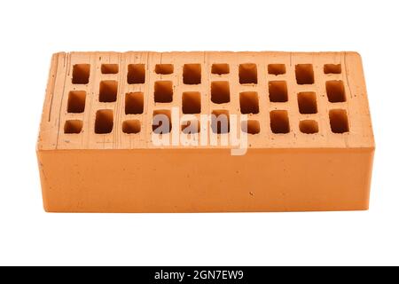 Perforated red brick isolated on white background in stretcher perspective Stock Photo