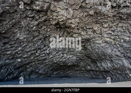 Basalt rock cave on Reynisfjara beach in Iceland Stock Photo