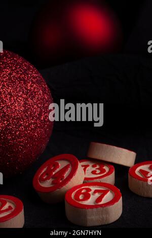 red christmas balls and bingo numbers on black background Stock Photo