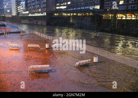 Pictures by Phil Taylor ARPS. Tel 07947390596 email philtaylorphoto@gmail.com  For Alamy.com 20 January 2021. Salford, Manchester, England. The River Irwell, where it flows between the cities of Salford and Manchester overflows onto the paving near the Lowry Hotel following Storm Christoph.Pictures by Phil Taylor ARPS. Tel 07947390596  email philtaylorphoto@gmail.com  For Alamy.com Stock Photo