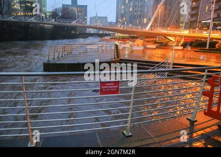 20 January 2021. Salford, Manchester, England. The River Irwell, where it flows between the cities of Salford and Manchester overflows onto the paving near the Lowry Hotel following Storm Christoph.Pictures by Phil Taylor ARPS. Stock Photo