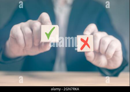 Accept and Decline. making decision pros and cons. Choices Tick Yes No Choose Mark Decision. businessman makes decision, Hands of businessman chooses Stock Photo