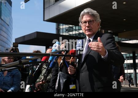 Brussels, Belgium. 23rd Sep, 2021. Thierry Breton speaks to media outside European Commission headquarters following a press conference on a global solution on charging electronic devices in Brussels, Belgium, 23 September 2021. Credit: ALEXANDROS MICHAILIDIS/Alamy Live News Stock Photo