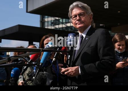 Brussels, Belgium. 23rd Sep, 2021. Thierry Breton speaks to media outside European Commission headquarters following a press conference on a global solution on charging electronic devices in Brussels, Belgium, 23 September 2021. Credit: ALEXANDROS MICHAILIDIS/Alamy Live News Stock Photo