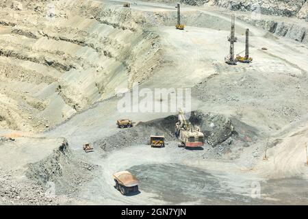 Electric rope shovel blasthole drills  at a copper mine in Chile Stock Photo