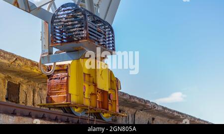 Railway crane wheel on rail Stock Photo