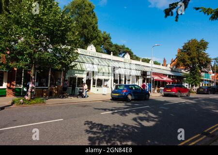 The Broadway with parked cars. Woodhall Spa, Lincolnshire, England. Stock Photo