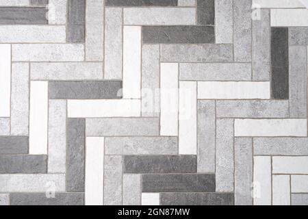 Mosaic floor tiles in rectangles in shades of gray and white closeup Stock Photo