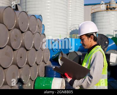 Manufacture worker check the number of drums Stock Photo