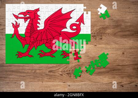 Jigsaw puzzle solution for the flag of Wales in the United Kingdom Stock Photo