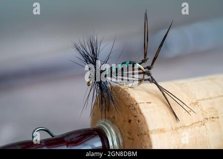 Two fly-fishing grasshopper flies Stock Photo - Alamy