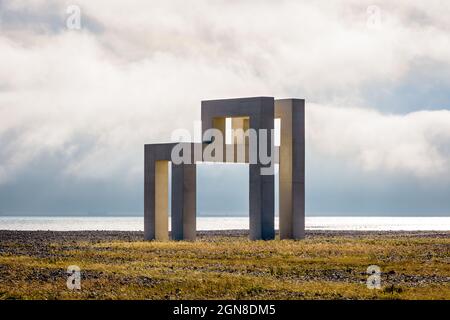 The "UP#3" monumental sculpture in white concrete on the beach in Le Havre, France, on a stormy evening. Stock Photo