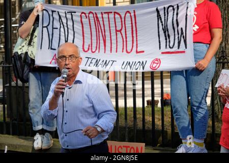 Halifax, Nova Scotia, Canada. September 23rd, 2021. Gary Burrill NS NDP Leader and MLA for Halifax Chebucto speaking at rally organised by ACORN gather in front of the provincial legislation for an all day protest against the decision of the Houston government to end the current Rent Cap implemented at the start of the pandemic, and to demand that the legislature implement rent control regulations in the province which, like most of the country, faces a severe lack of affordable housing, a situation that has worsened over the last 19 months. Credit: meanderingemu/Alamy Live News Stock Photo