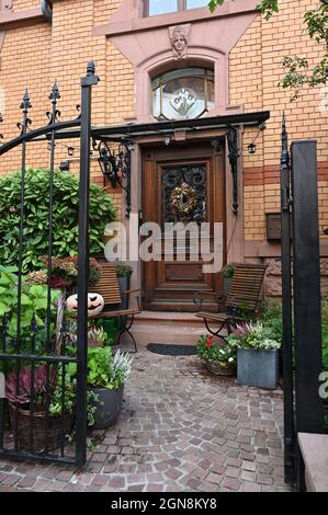 House entrance of a villa in the style of historicism, autumnal decorated Stock Photo