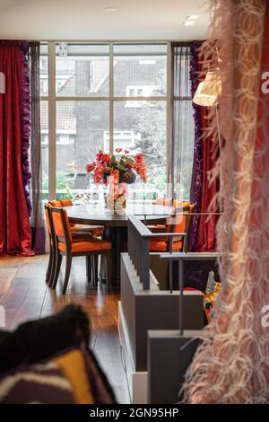 Interior of dining zone in modern studio apartment Stock Photo
